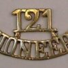 121 PIONEERS cast brass shoulder title