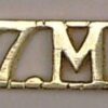 27 M.B cast brass shoulder title