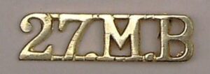 27 M.B cast brass shoulder title