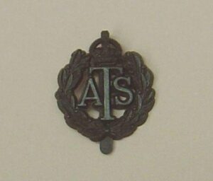 A.T.S. plastic cap badge