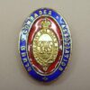 BLUES COMRADES ASSOCIATION gilt red blue enamel