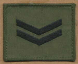CORPORAL embroidered back on olive green patch