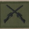 CROSSED RIFLES embroidered black on green patch