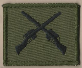 CROSSED RIFLES embroidered black on green patch