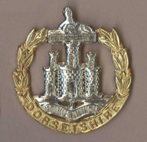 DORSETSHIRE 'Blank scroll' bi/m or's cap badge