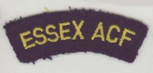 SEX A.C.F. S/T embroidered yellow on dk.blue