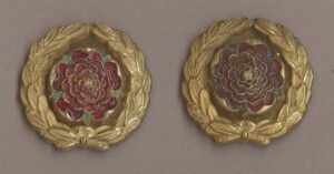 AMPSHIRE REGIMENT' gilt rose, red enamel, pair