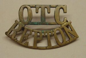 O.T.C. - REPTON brass shoulder title