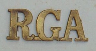 R.G.A. - ROYAL GARRISON ARTILLERY brass shoulder