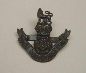LOYAL NORTH LANCASHIRE O.S.D bronze cap badge