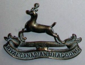 ROYAL CANADIAN DRAGOONS cap badge dark g/m