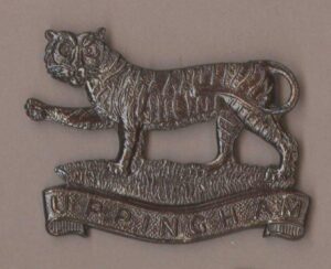 PINGHAM school O.T.C. bronzed or's cap badge r/s