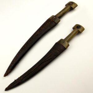 East African Jambiya Dagger two piece shaped horn grip, in leather covered scabbard