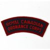 Royal Canadian Ordnance Corps Cloth Shoulder Title, Red on Black and Red