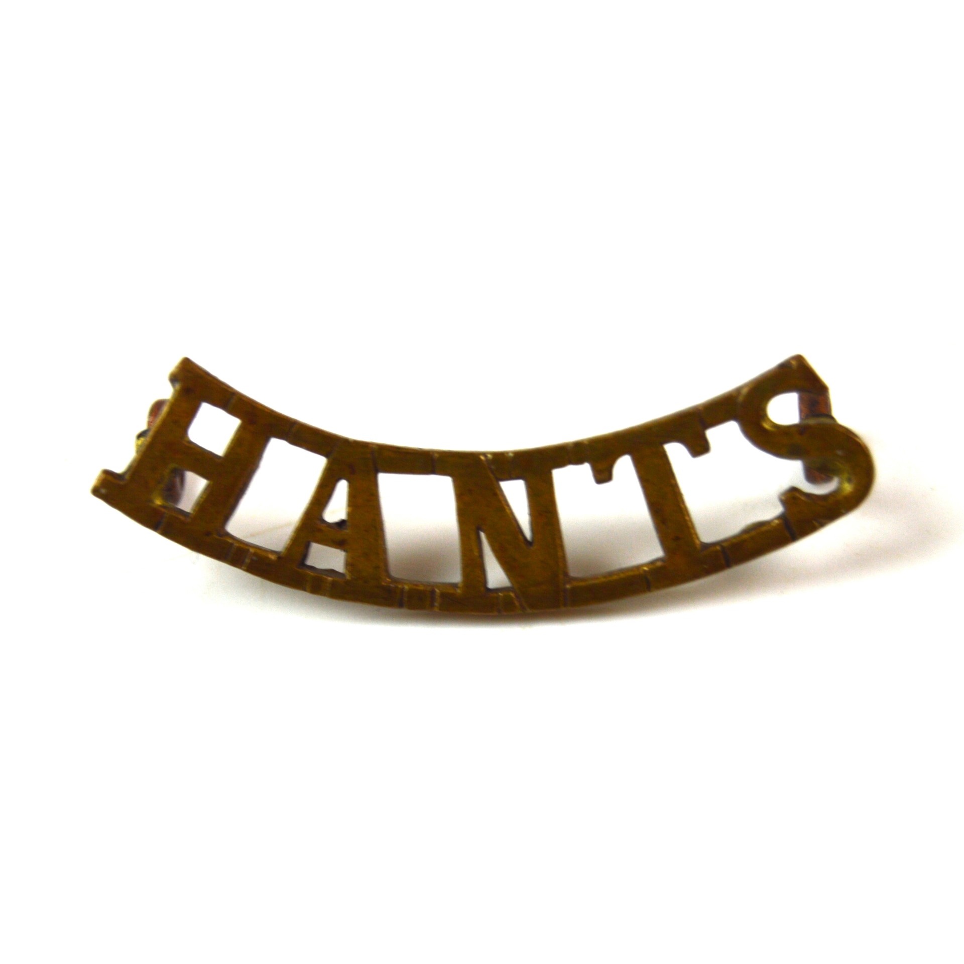 Hampshire Regiment (HANTS, Post-1902 Pattern) Curved Brass Shoulder Title